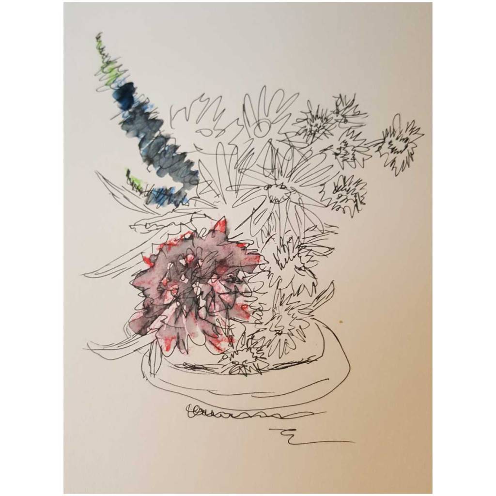 A vase of&nbsp;flora